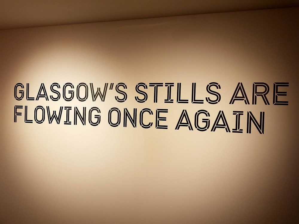 Text stating 'Glasgow's stills are flowing once again'